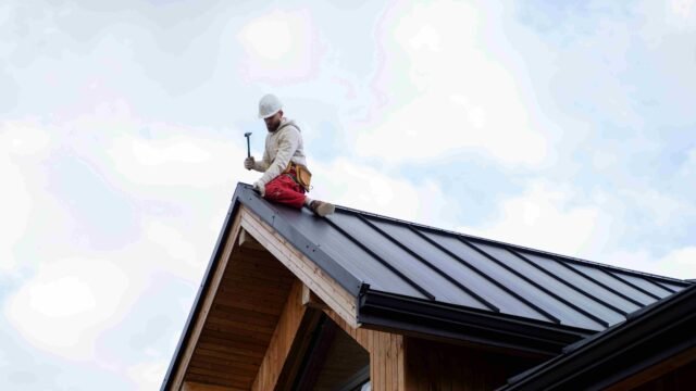 full-shot-man-working-roof-8_11zon