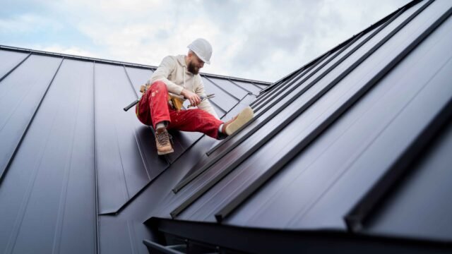 full-shot-man-working-roof-9_11zon